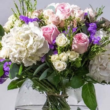 Elegant Centerpiece Flower Arrangement in Fish Bowl